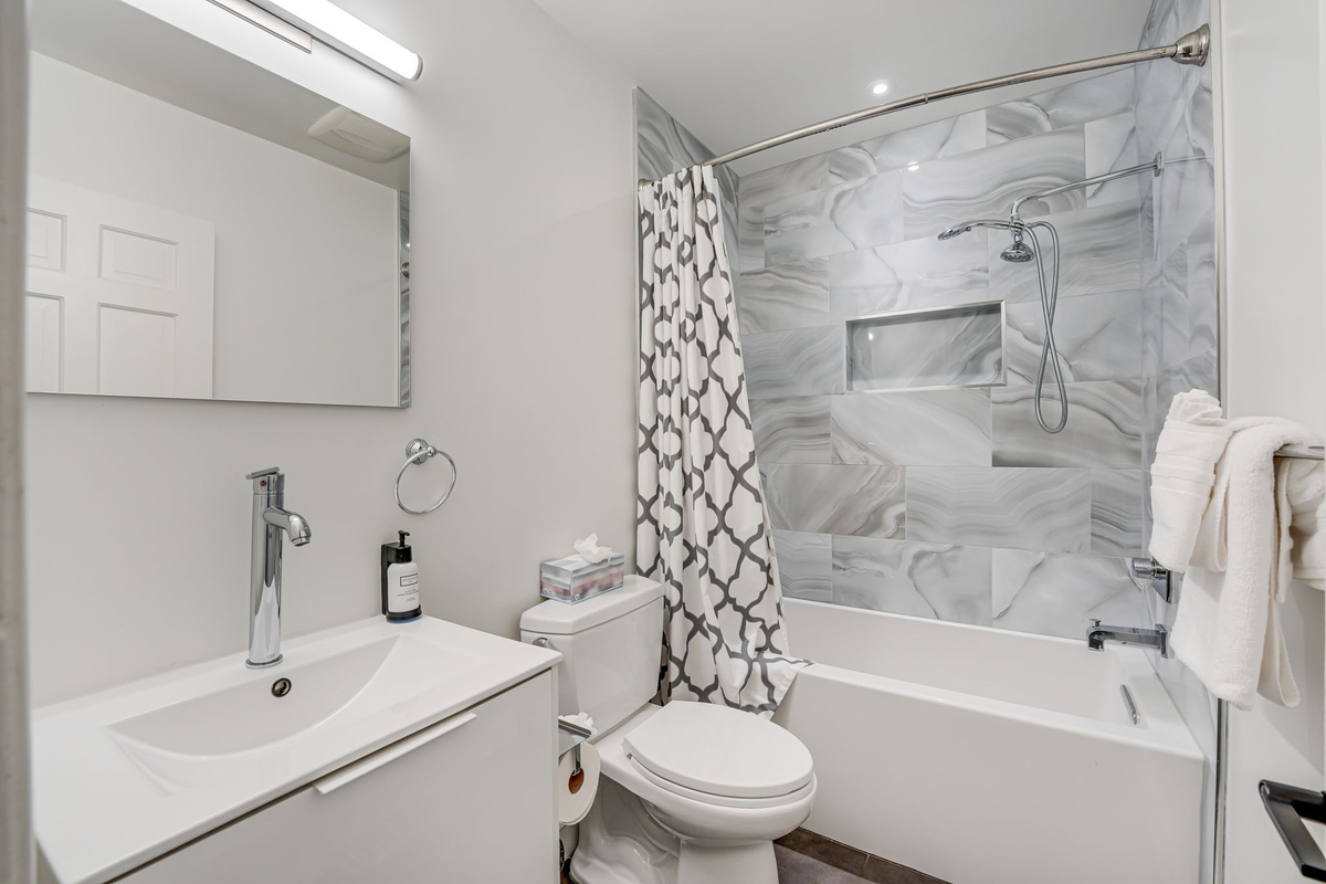 Guest Bathroom: Shower & Extra Deep Tub.