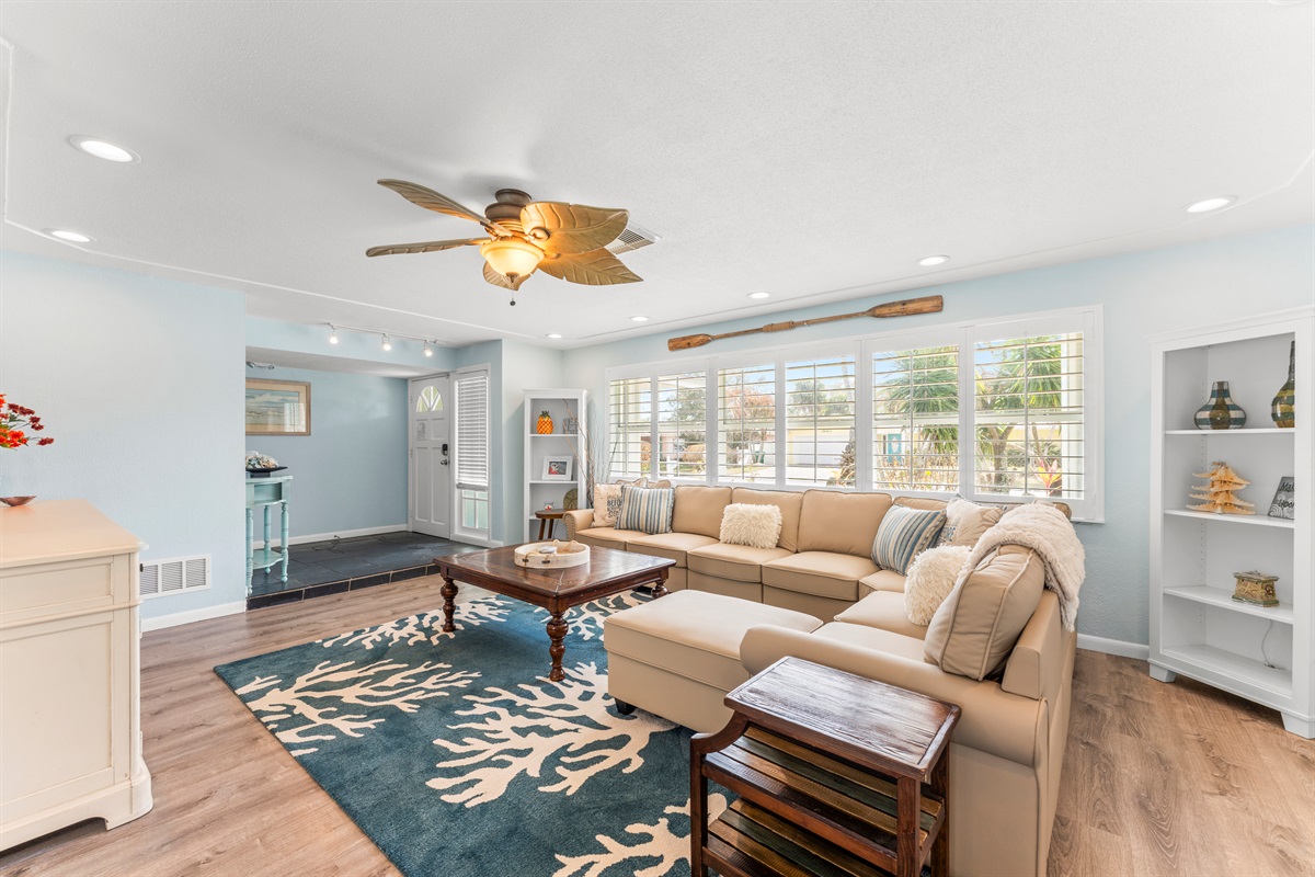 Large comfortable living room with a beachy vibe