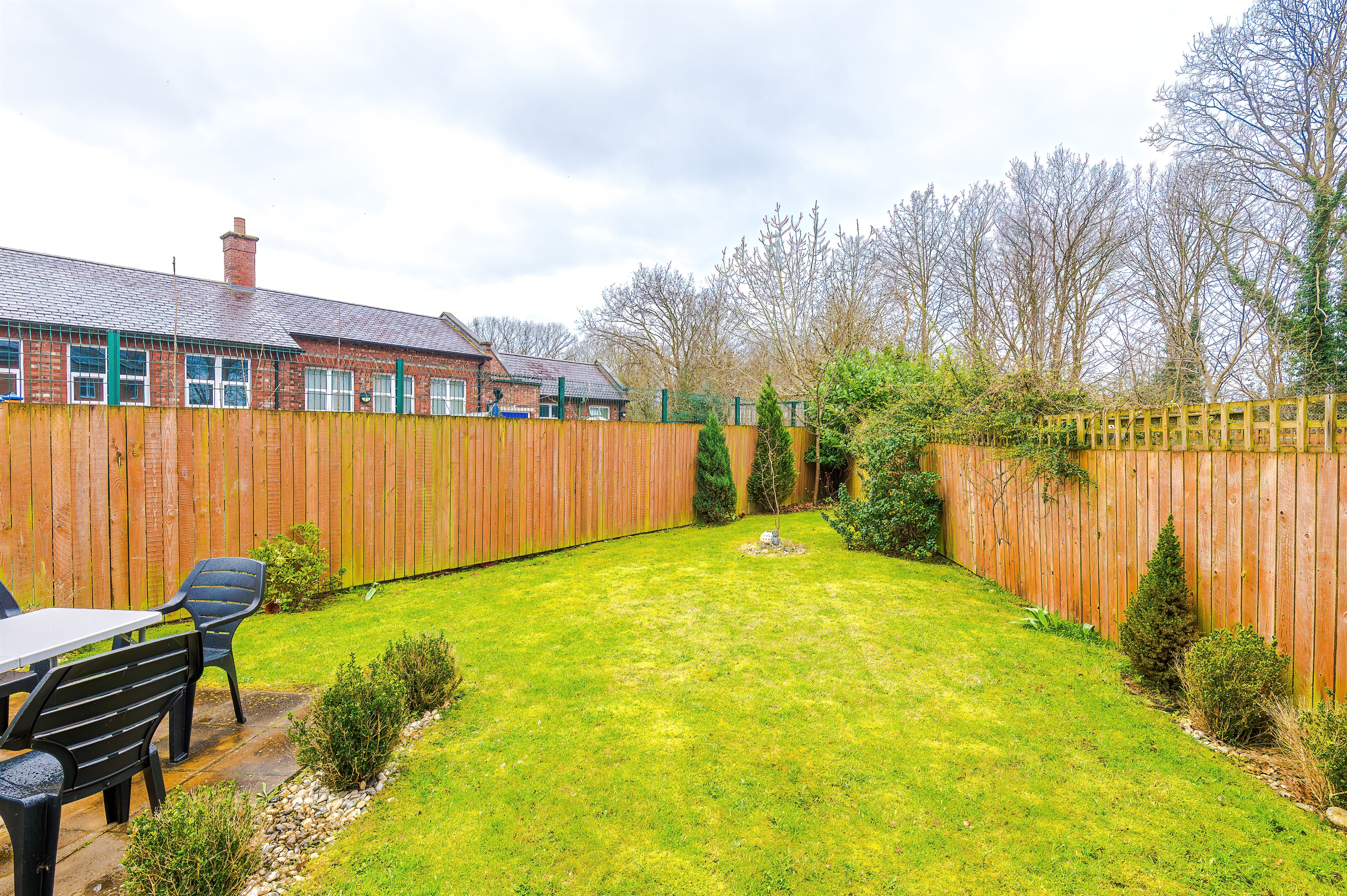 The relaxing rear garden benefits from outdoor table and chairs, perfect for enjoying the sun!