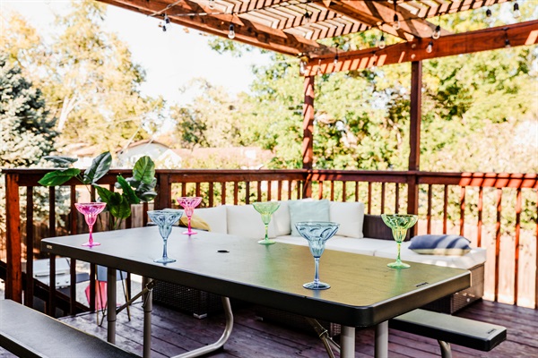 Scenic Balcony Retreat  – Take a moment to reconnect with loved ones as you relax on our balcony's comfortable patio chairs, complete with plush cushions. Don't forget to bring a bottle of your favorite wine for the perfect evening!