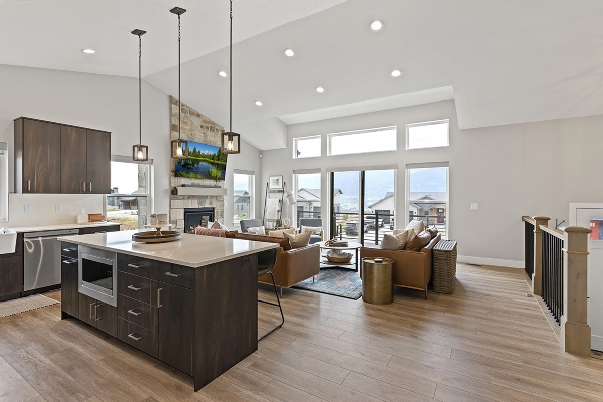 Bright open kitchen with oversized island and beautiful mountain-facing windows