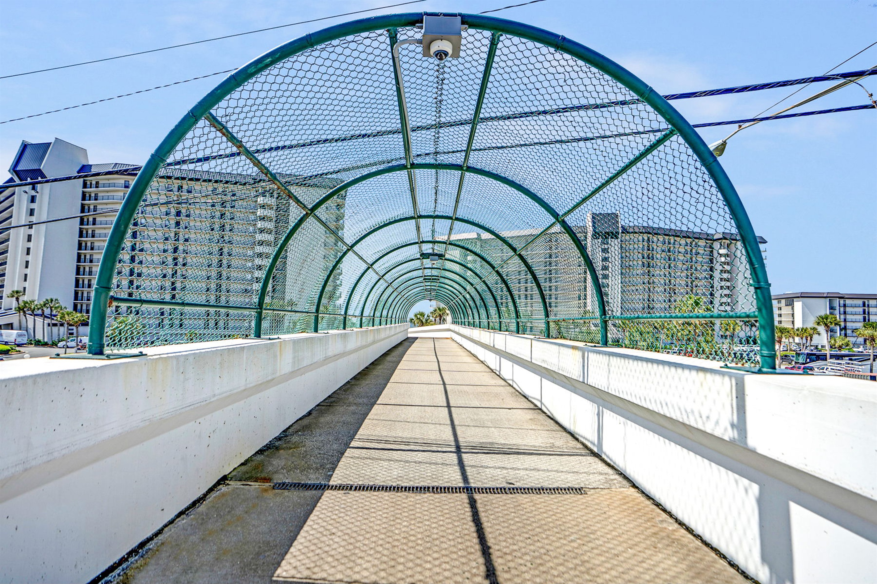 Walking inside the spacious and convenient walkover bridge