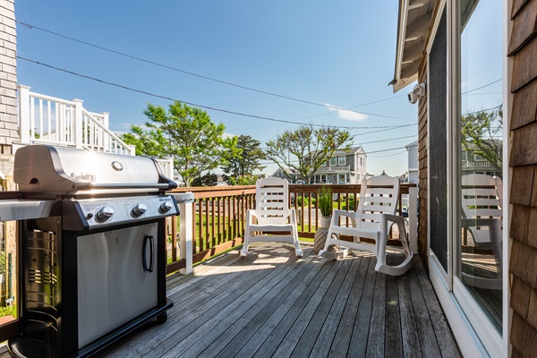 Step onto our welcoming porch, where the aroma of grilling delights sets the stage for flavorful meals and joyful gatherings.