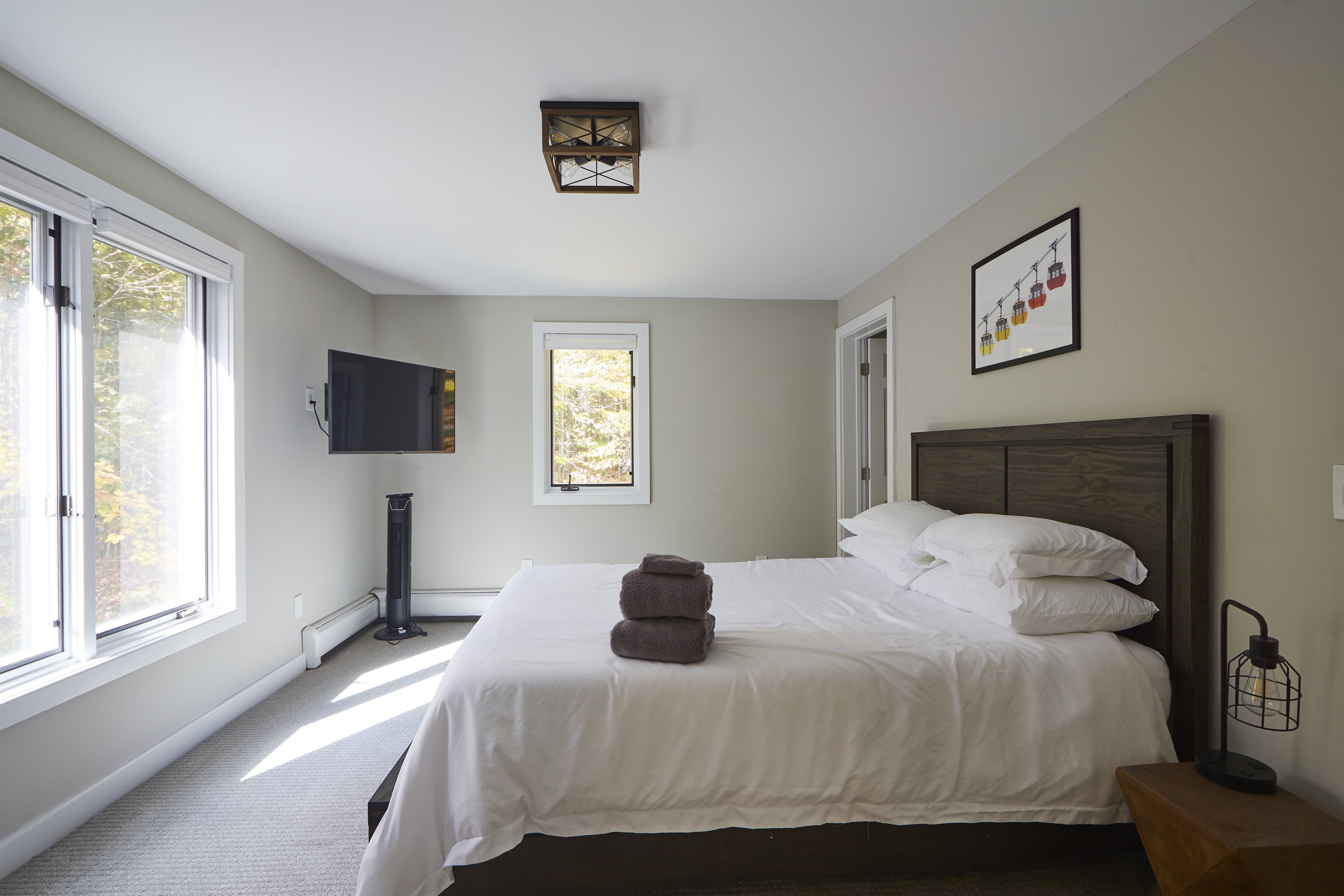 Private second-floor sun-filled bedroom with a bathroom.