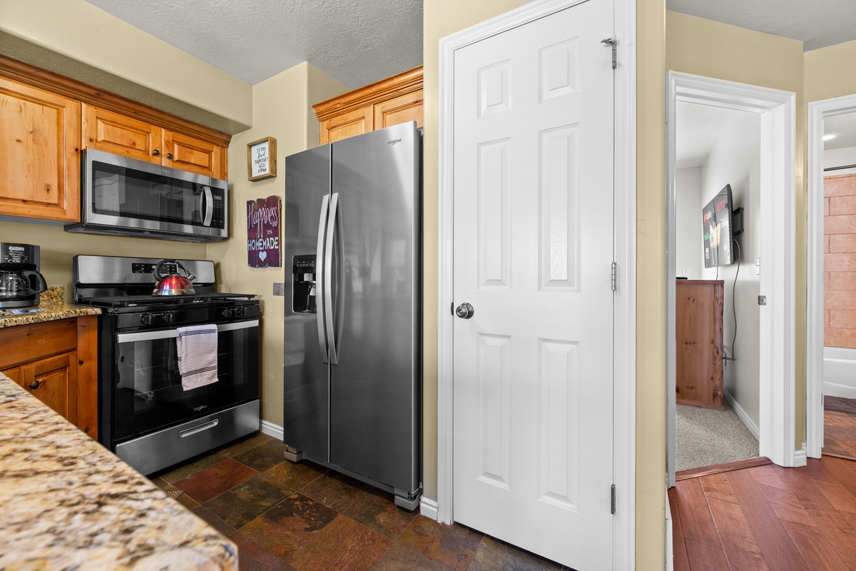 Cook your favorite meals in a kitchen bathed in natural light that enhance the culinary experience.