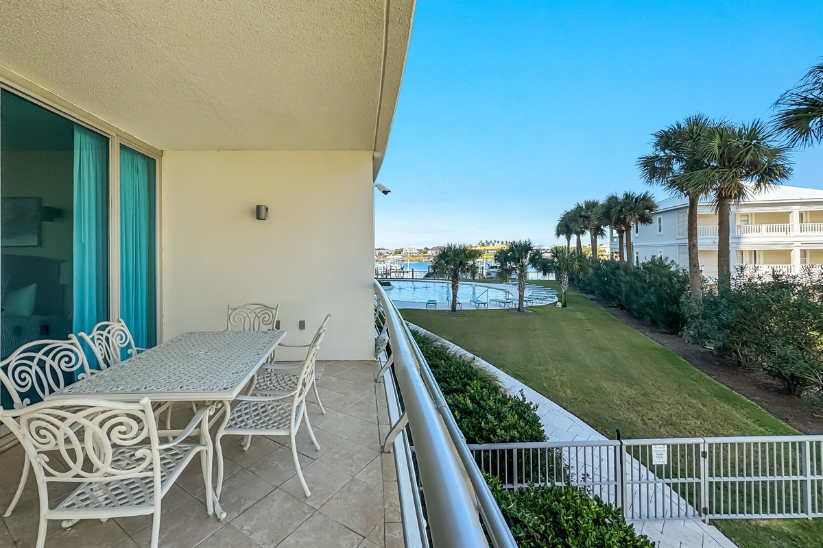 Wake up to this view! Enjoy your morning coffee or an evening meal on your private balcony overlooking the lush grounds and sparkling pool. Resort living at its finest.