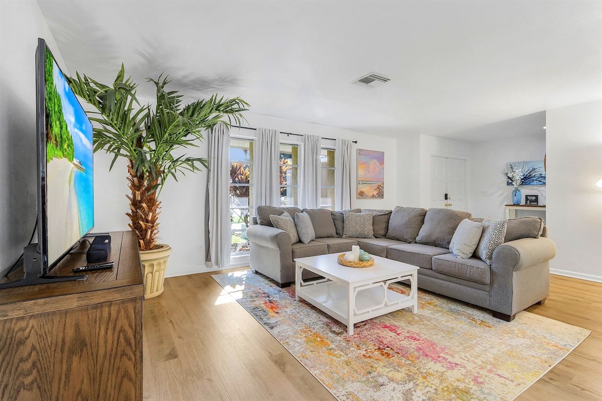 Relax in style in our spacious and cozy living area, complete with a large TV for your entertainment!