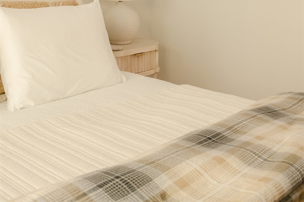 Luxurious and Comfortable Queen Bed in the Groom's Room