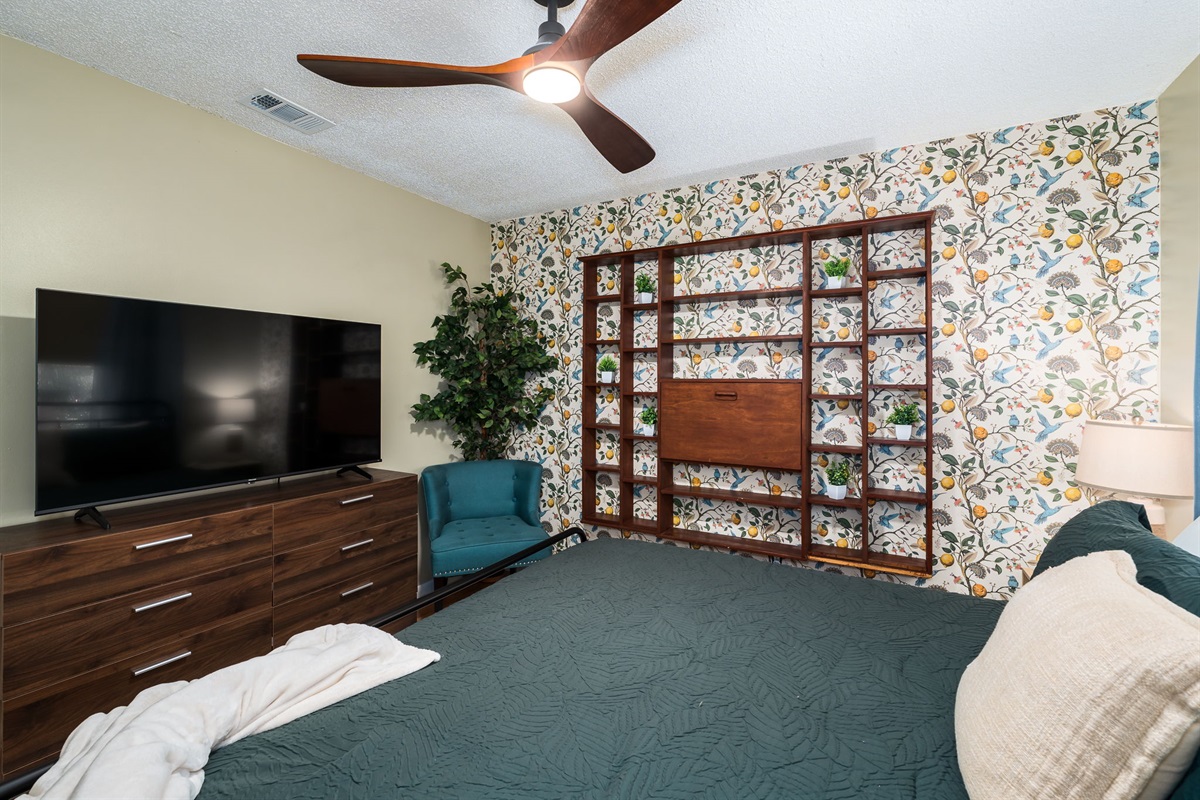 Primary Bedroom 1 - King size bed, full closet and dresser, and 55" TV! Perfect space to wind down at night.