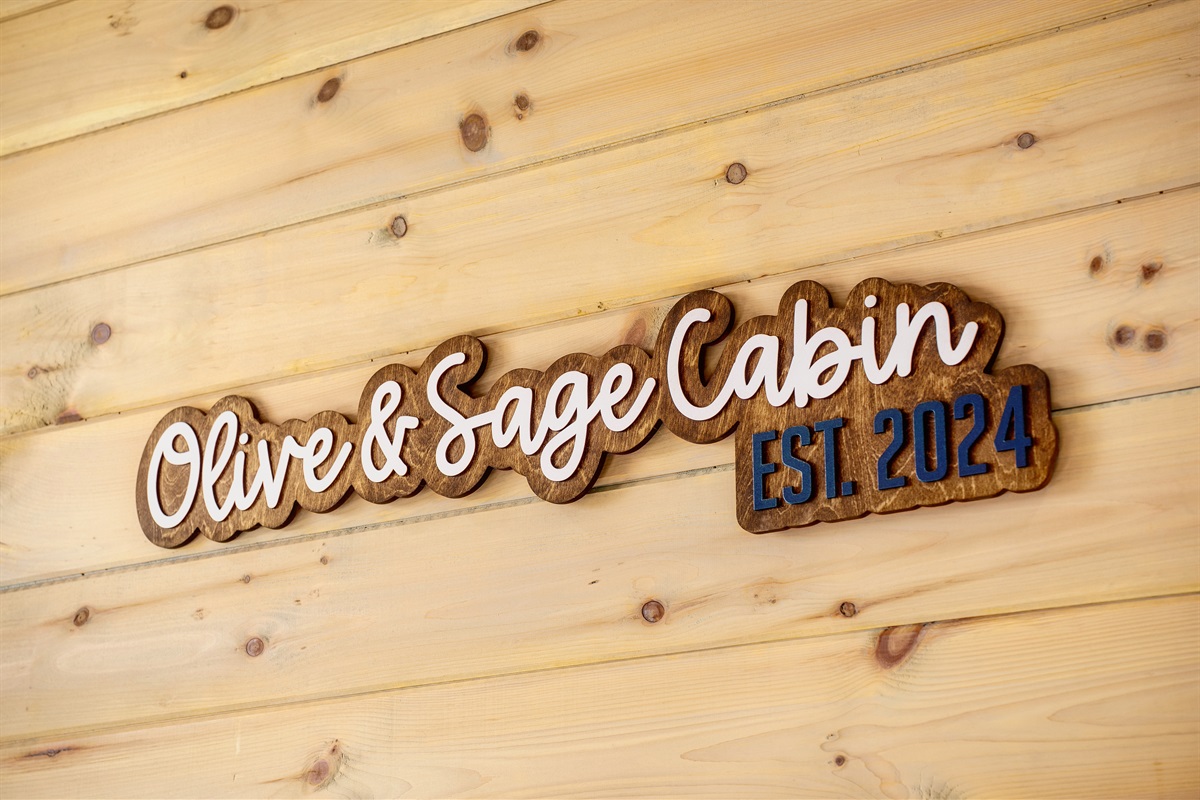 Olive and Sage Cabin est 2024. Welcome to your signature hilltop getaway.