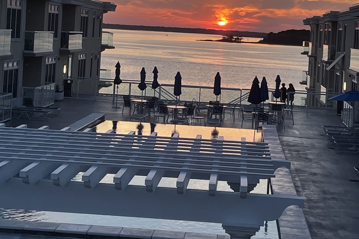 View from roof deck overlooking pool on the bay