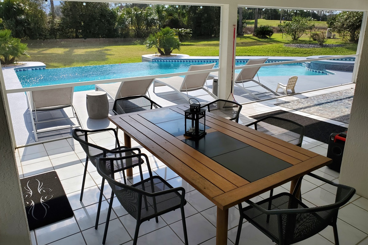 Lanai dining table and outdoor loungers