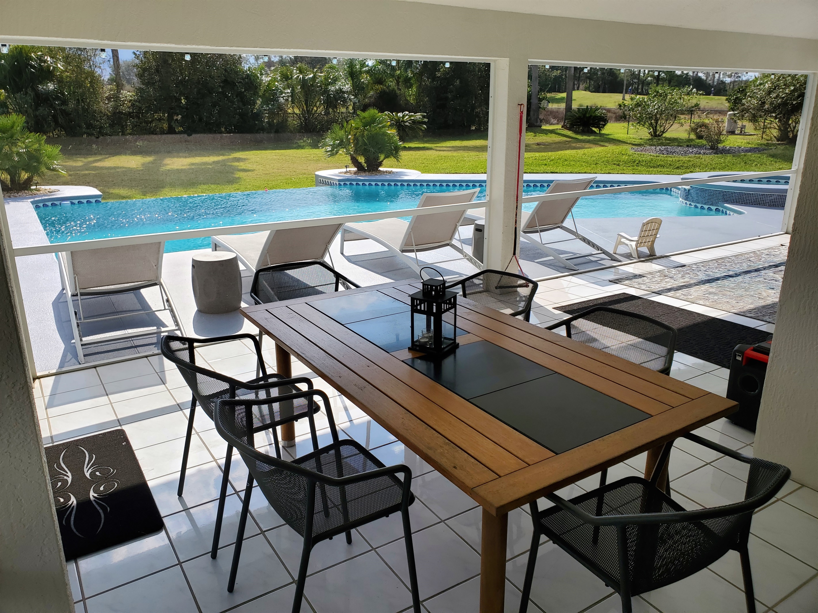 Lanai dining table and outdoor loungers
