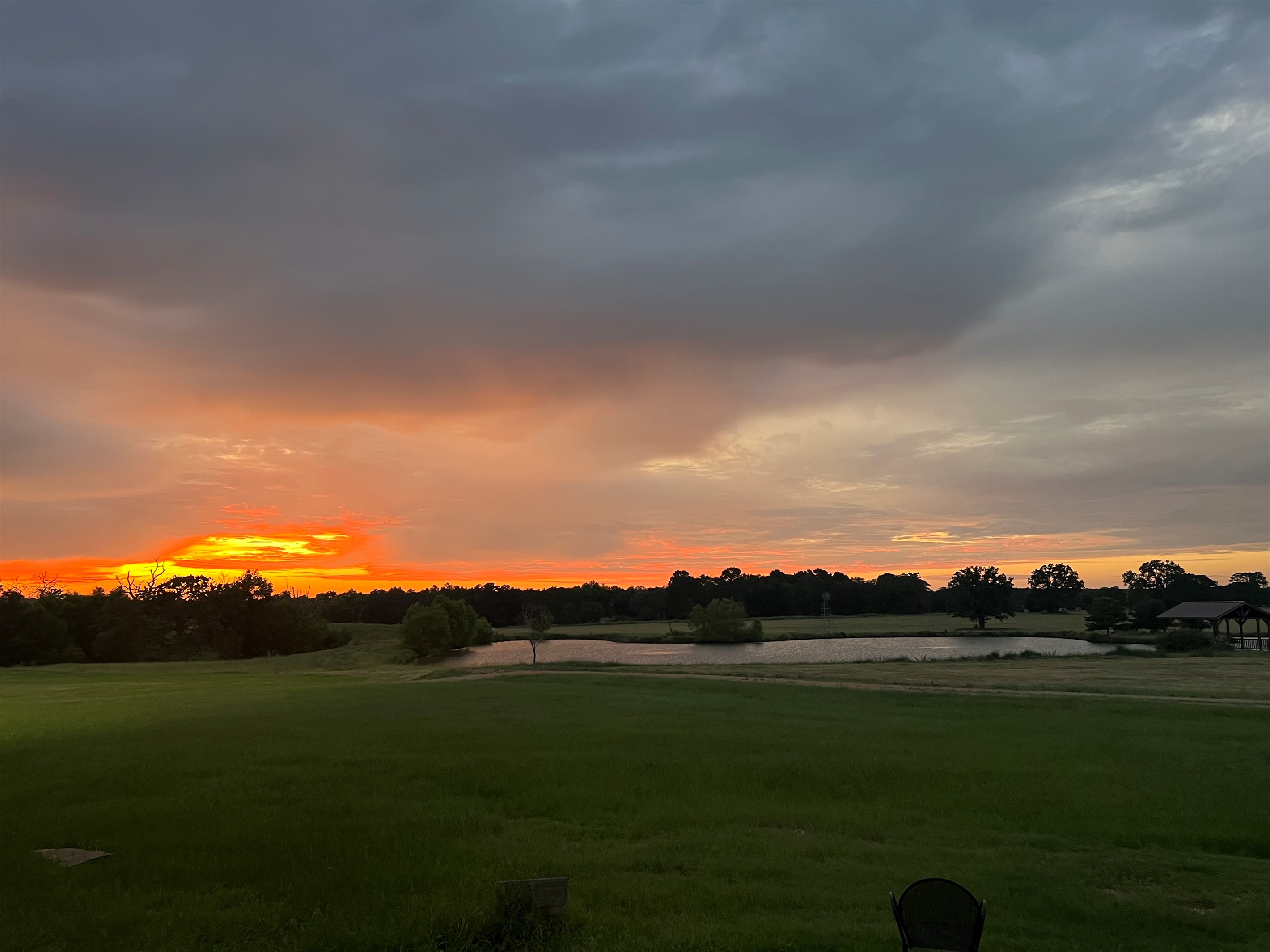 Sunset with over the 5 acre lake.