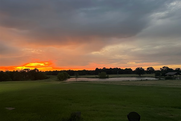 Sunset with over the 5 acre lake.