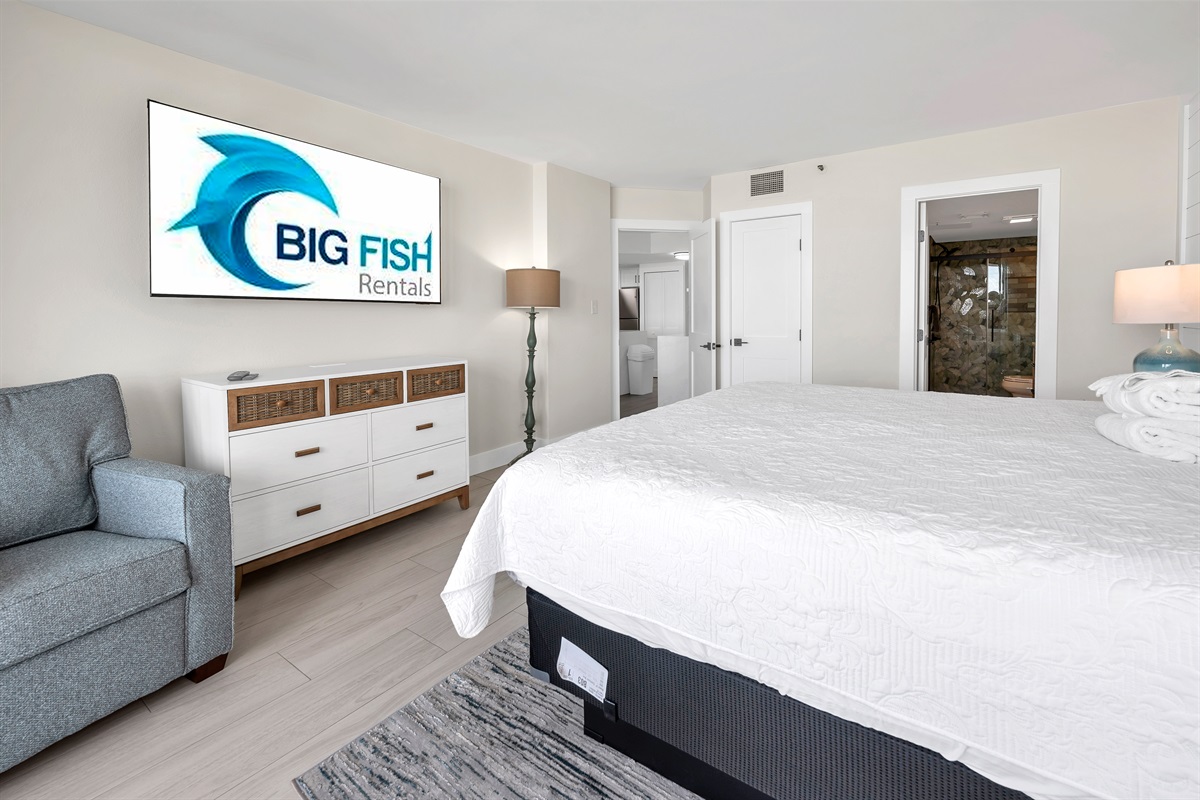 Beautifully designed master bedroom with ocean front view and balcony access