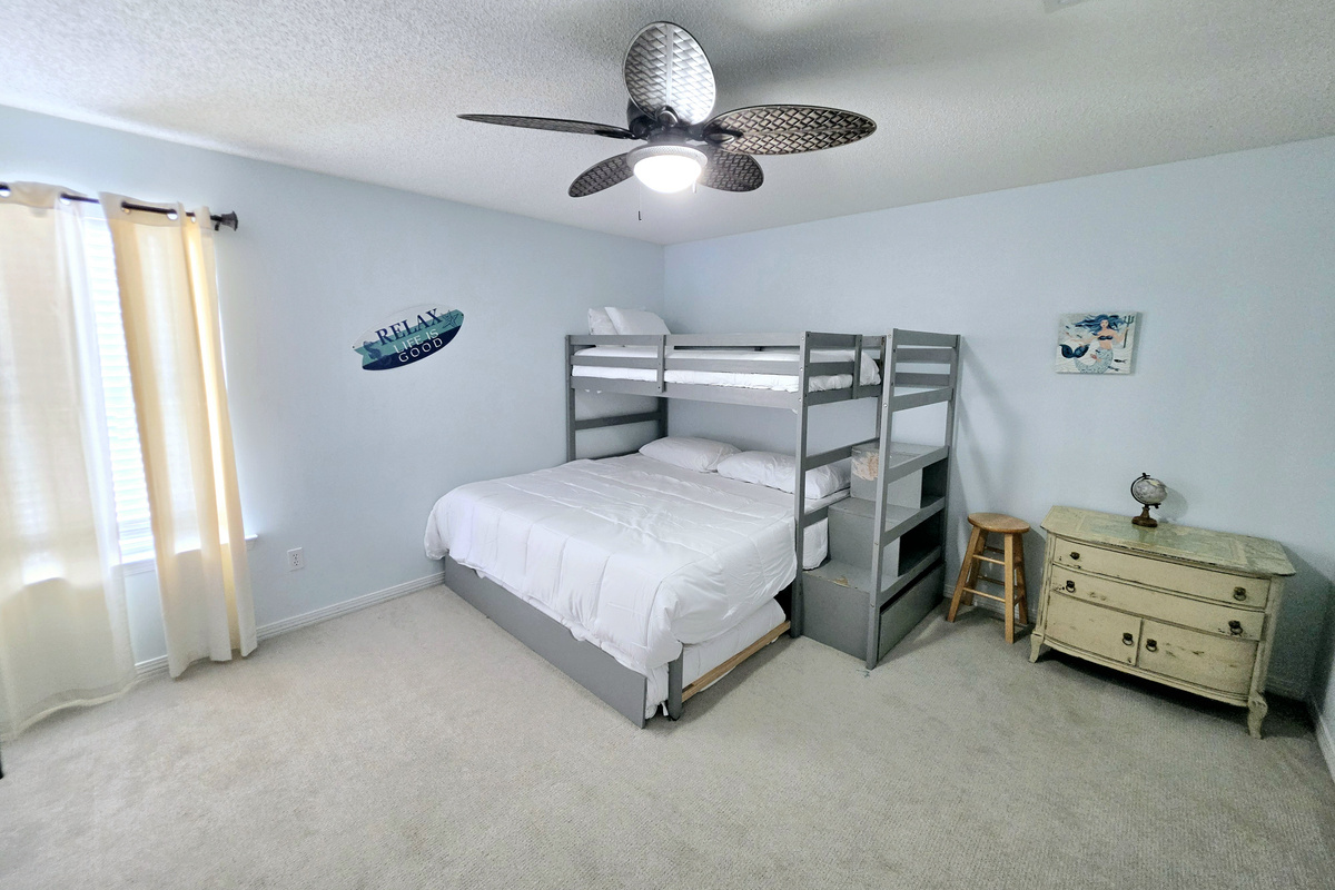 Bunk room with bunk bed and trundle