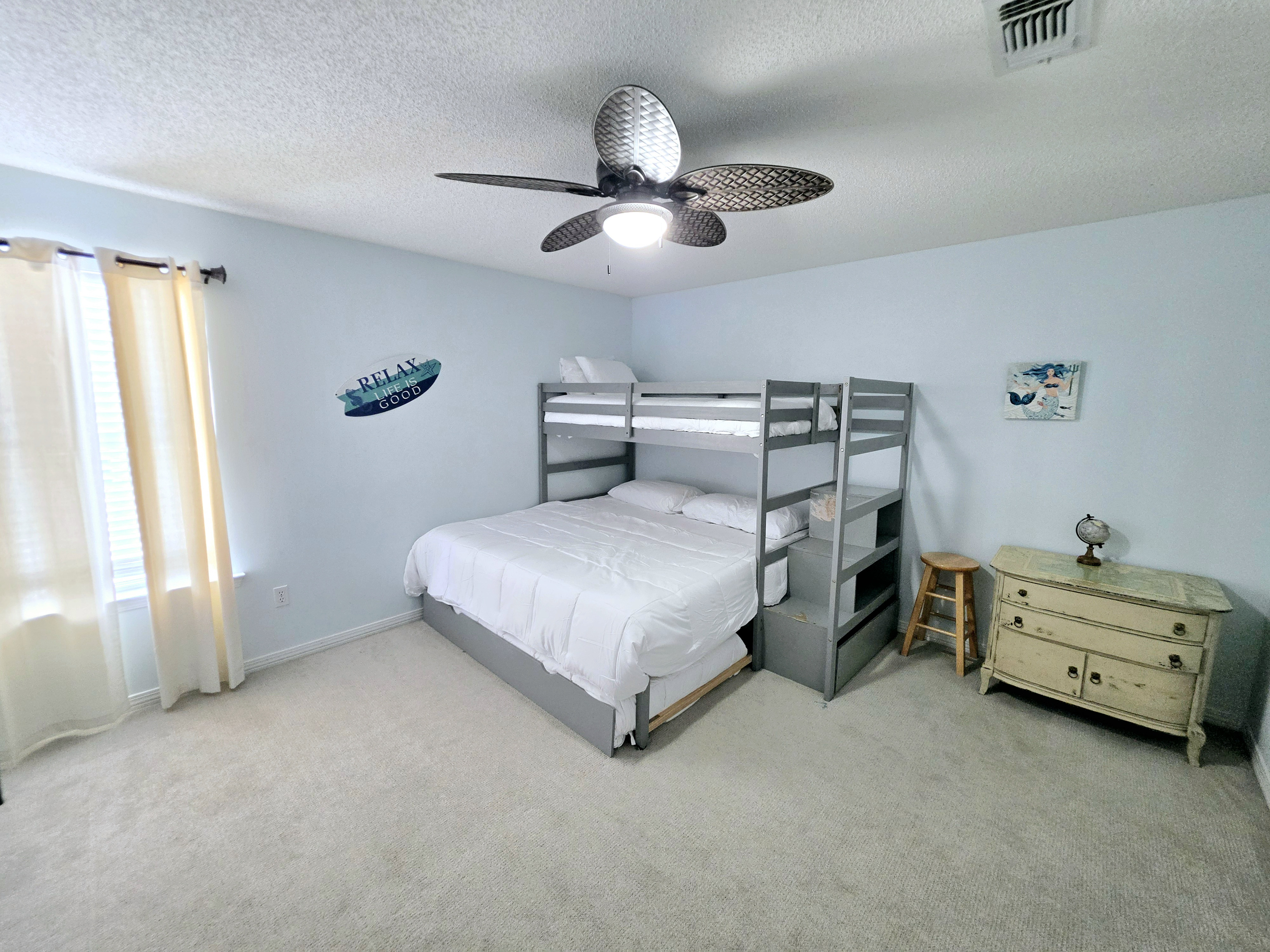 Bunk room with bunk bed and trundle