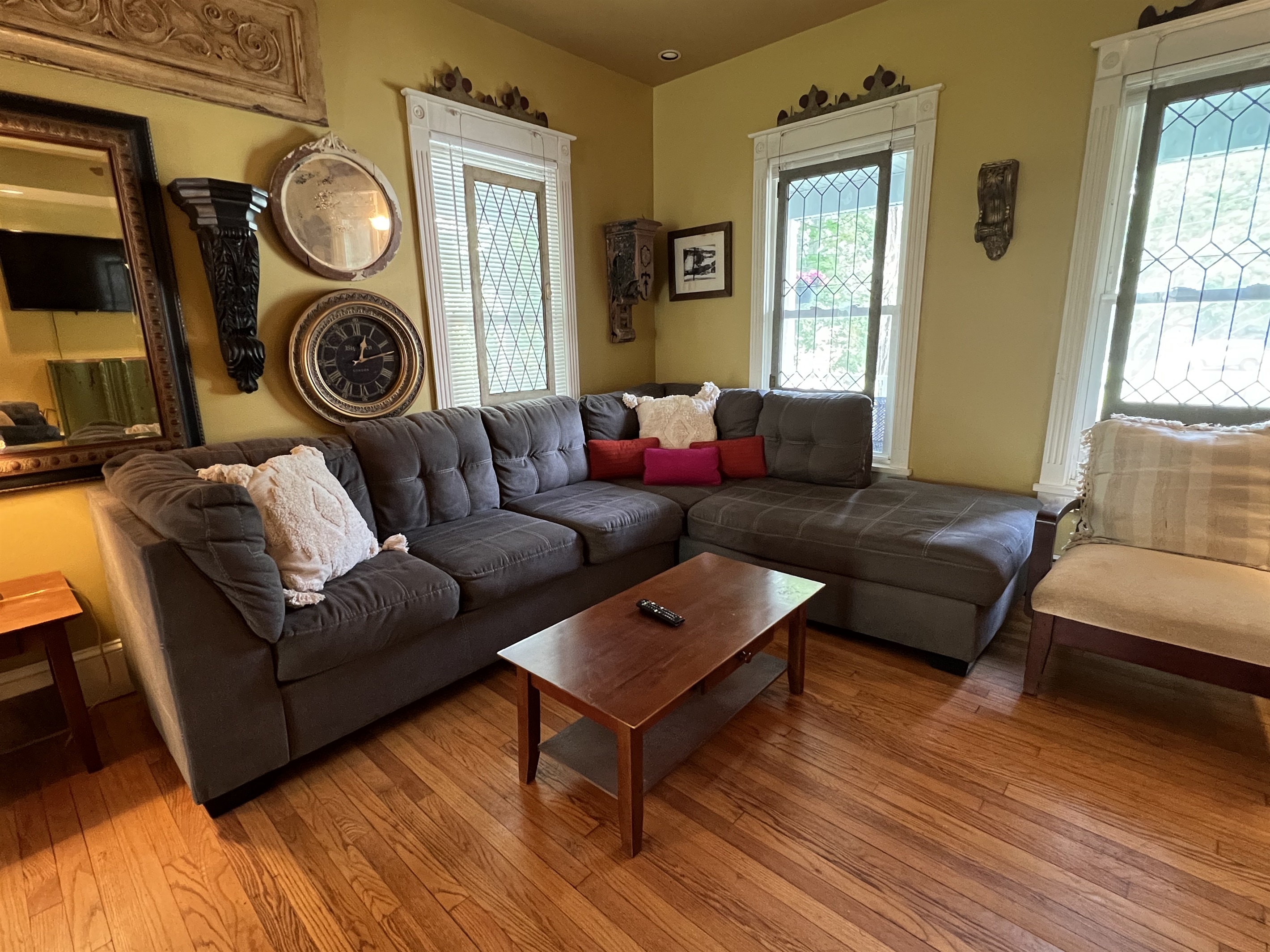 Living room w/ eclectic decor