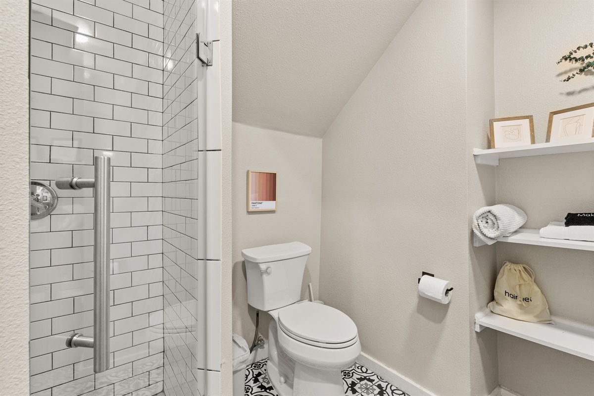 In this haven of cleanliness and calm, every shower is a reset, and every detail whispers the beauty of self-care