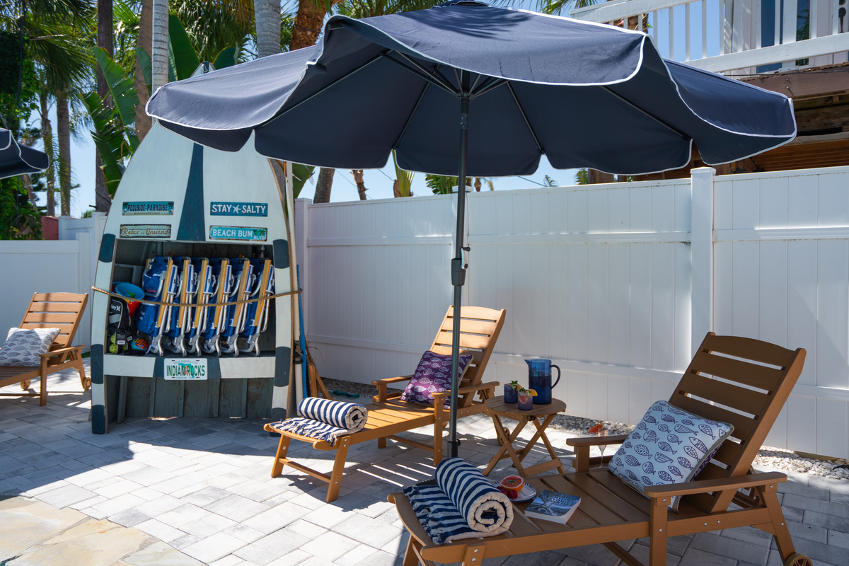 The Sailhouse backyard is stocked, shaded, and ready for your best beach days yet.