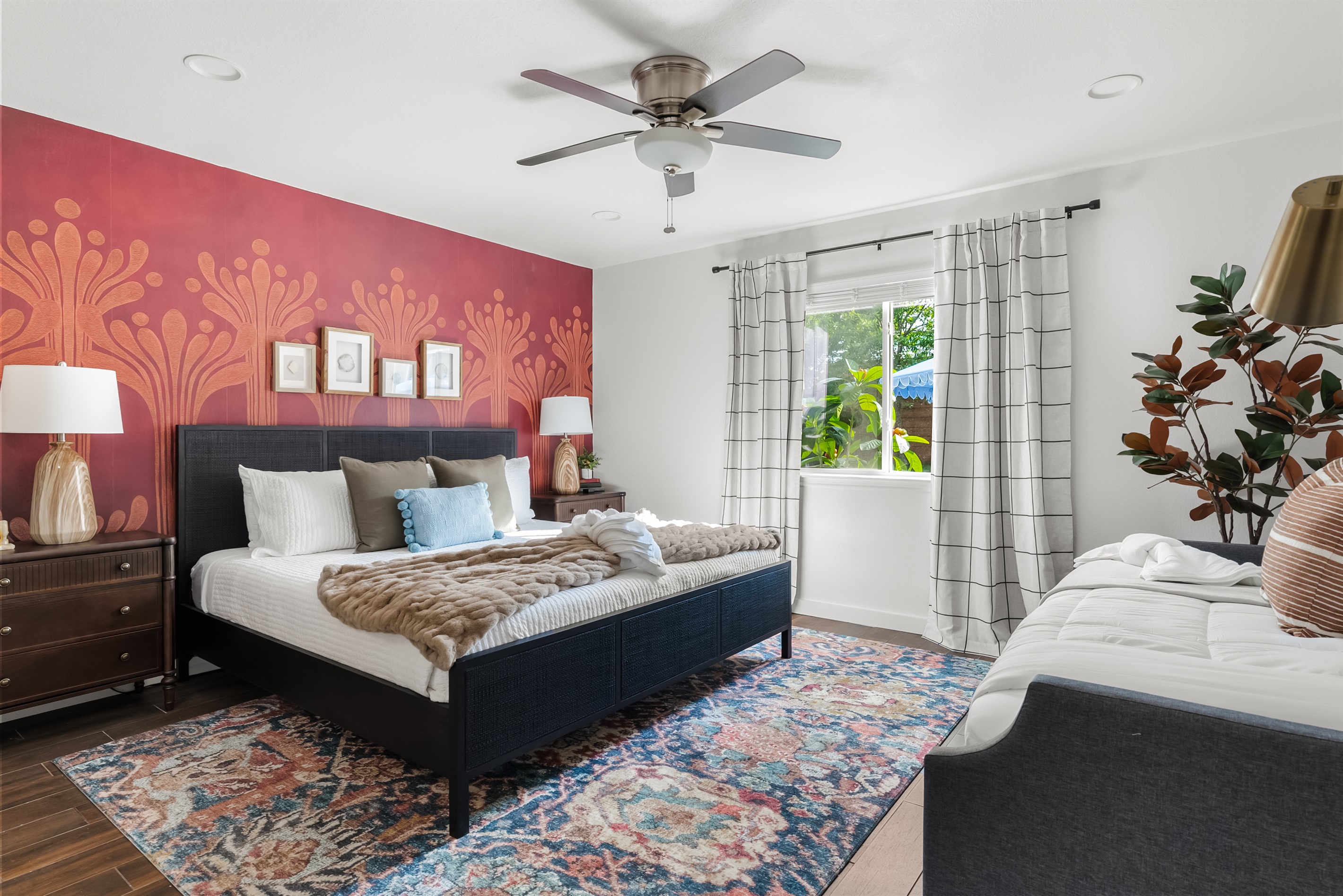 Primary Suite featuring king bed w/ stunning design