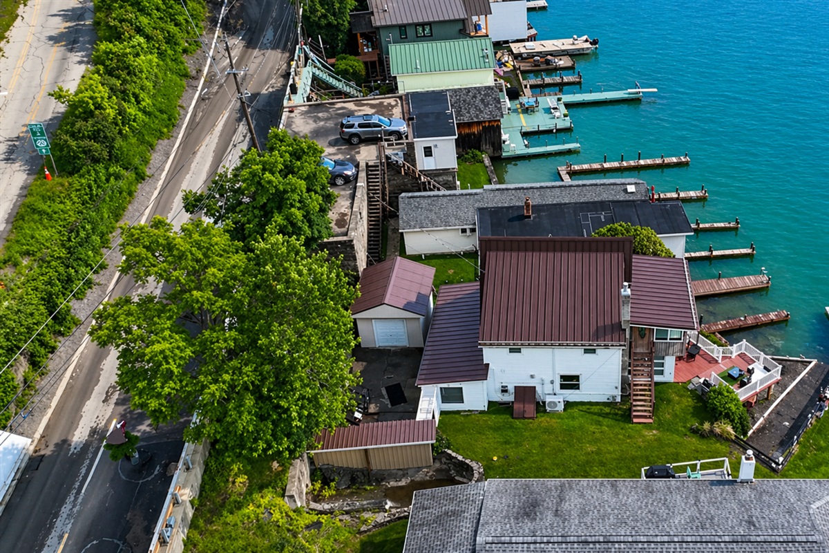 Unique multi-level layout with water access, patio seating, and unbeatable lakefront ambiance!