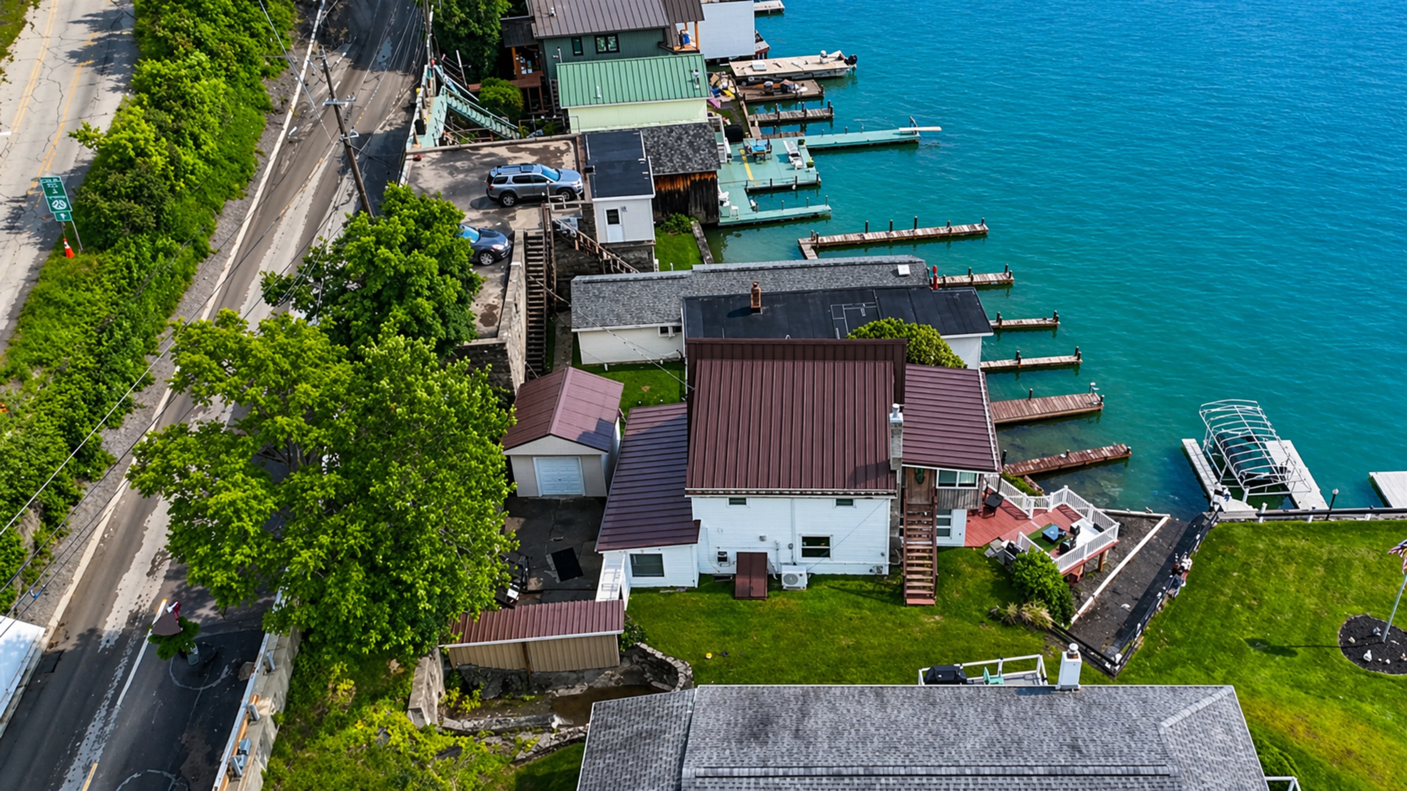Unique multi-level layout with water access, patio seating, and unbeatable lakefront ambiance!