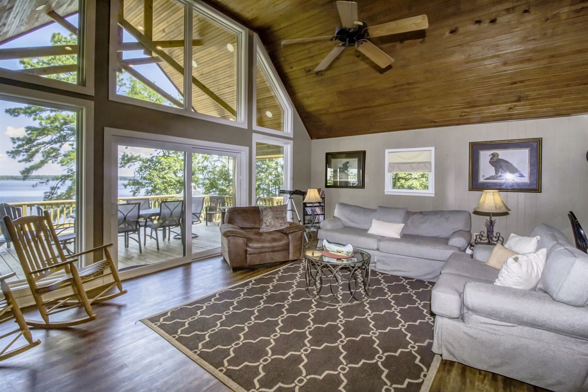 Great room with full back glass looking over lake... it truly is GREAT!