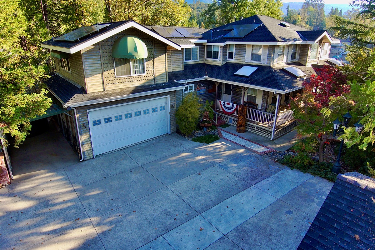 Front view of house from street & view of parking lot
