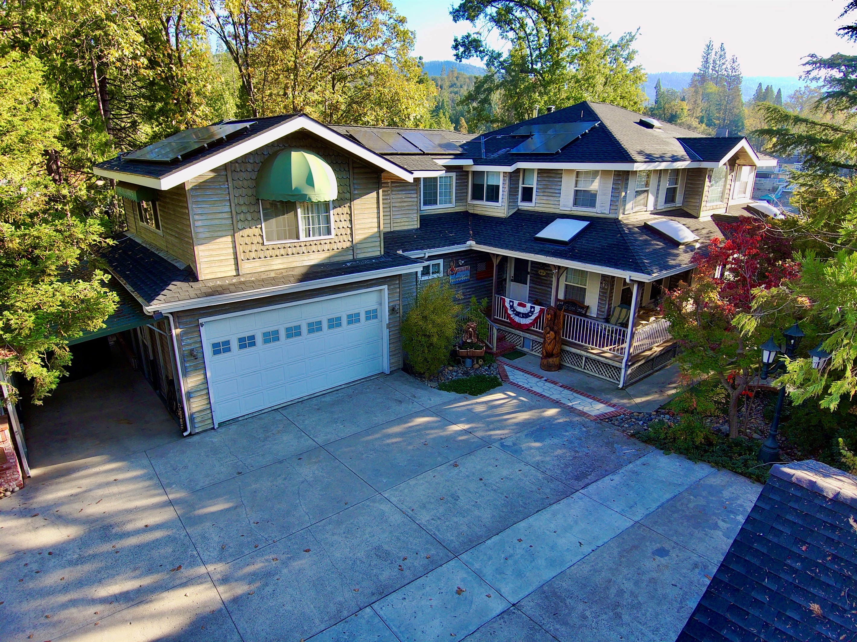 Front view of house from street & view of parking lot