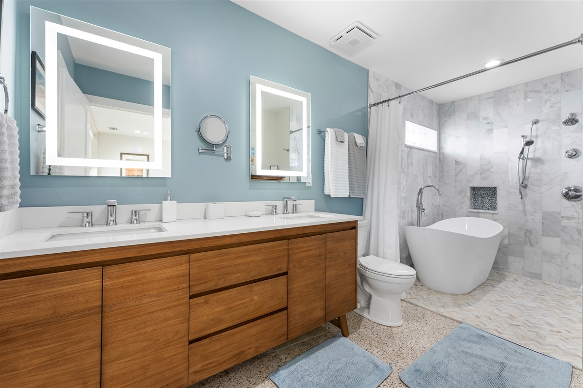 Sunset Suite bathroom in the Primary Bedroom also has a door to the pool area
