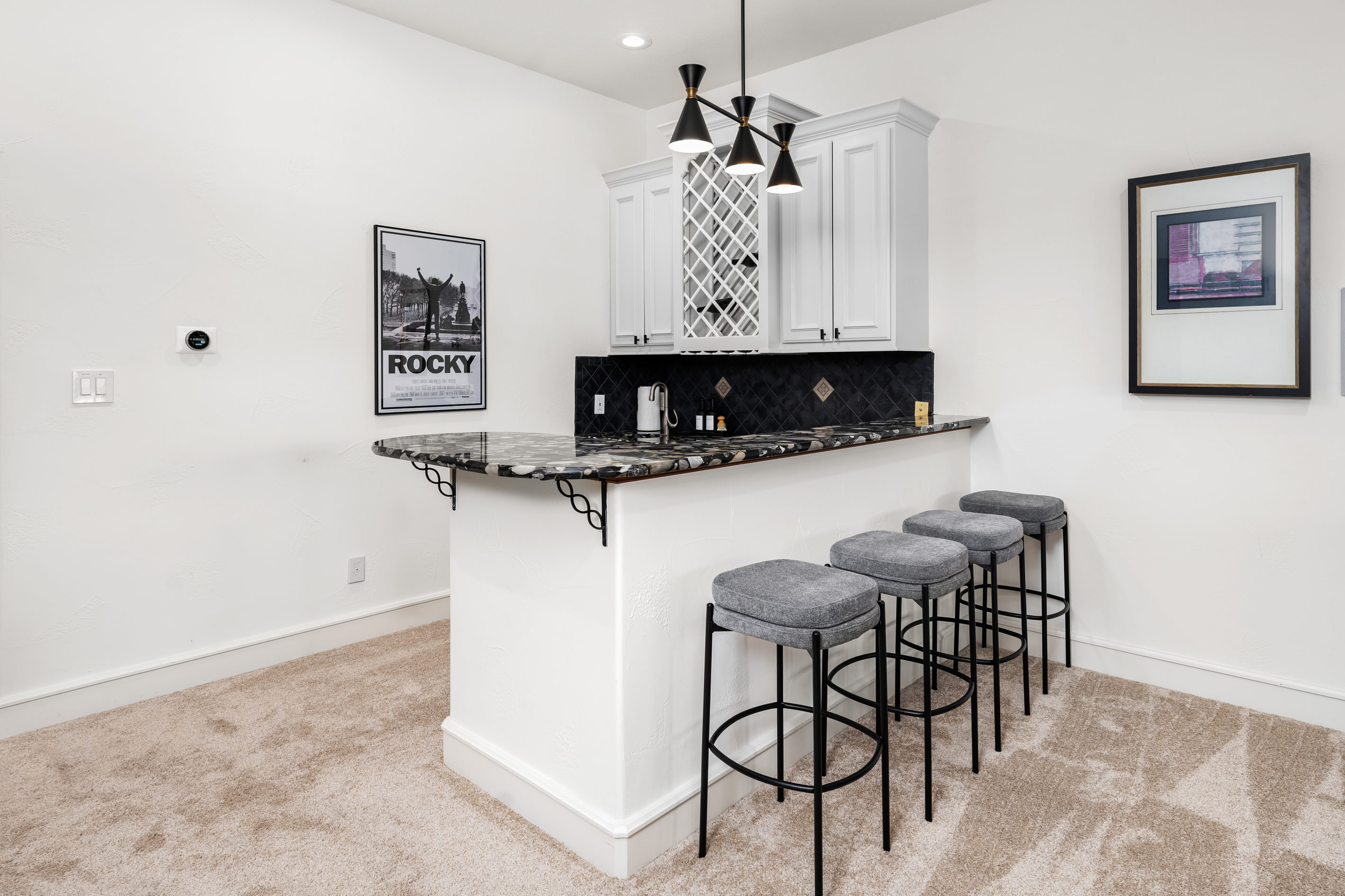 Enjoy drinks and conversation at this inviting upstairs bar.