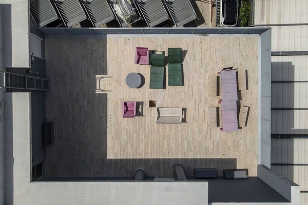 Soak up the sun on the shared rooftop terrace.