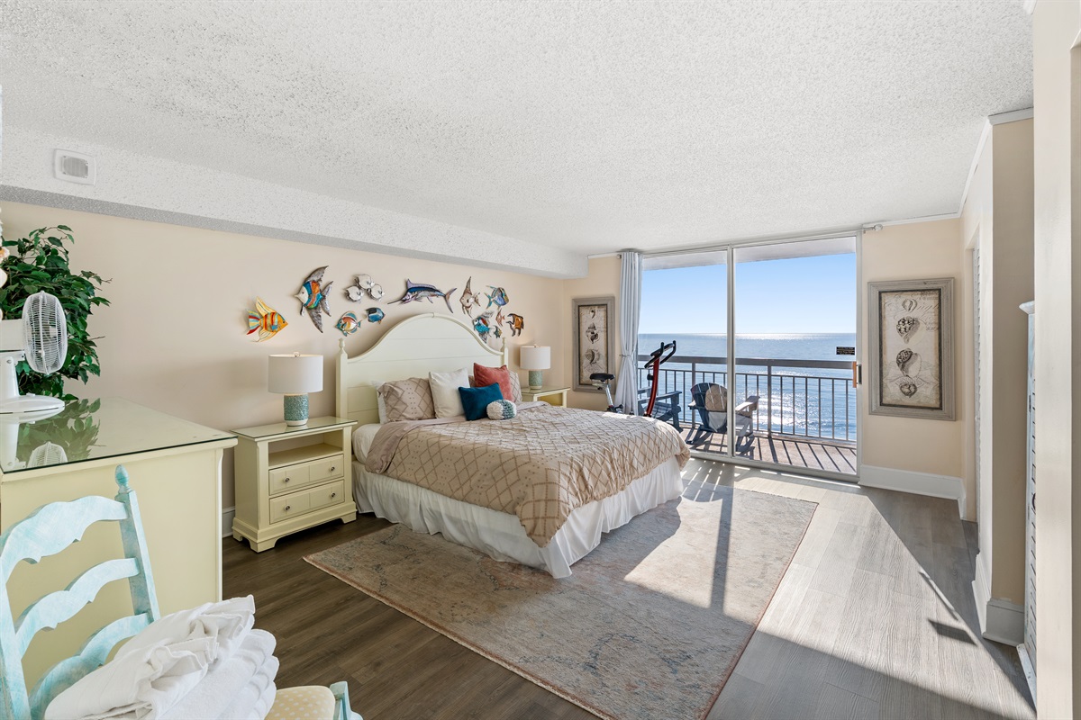 Spacious Main Bedroom with King bed and balcony access