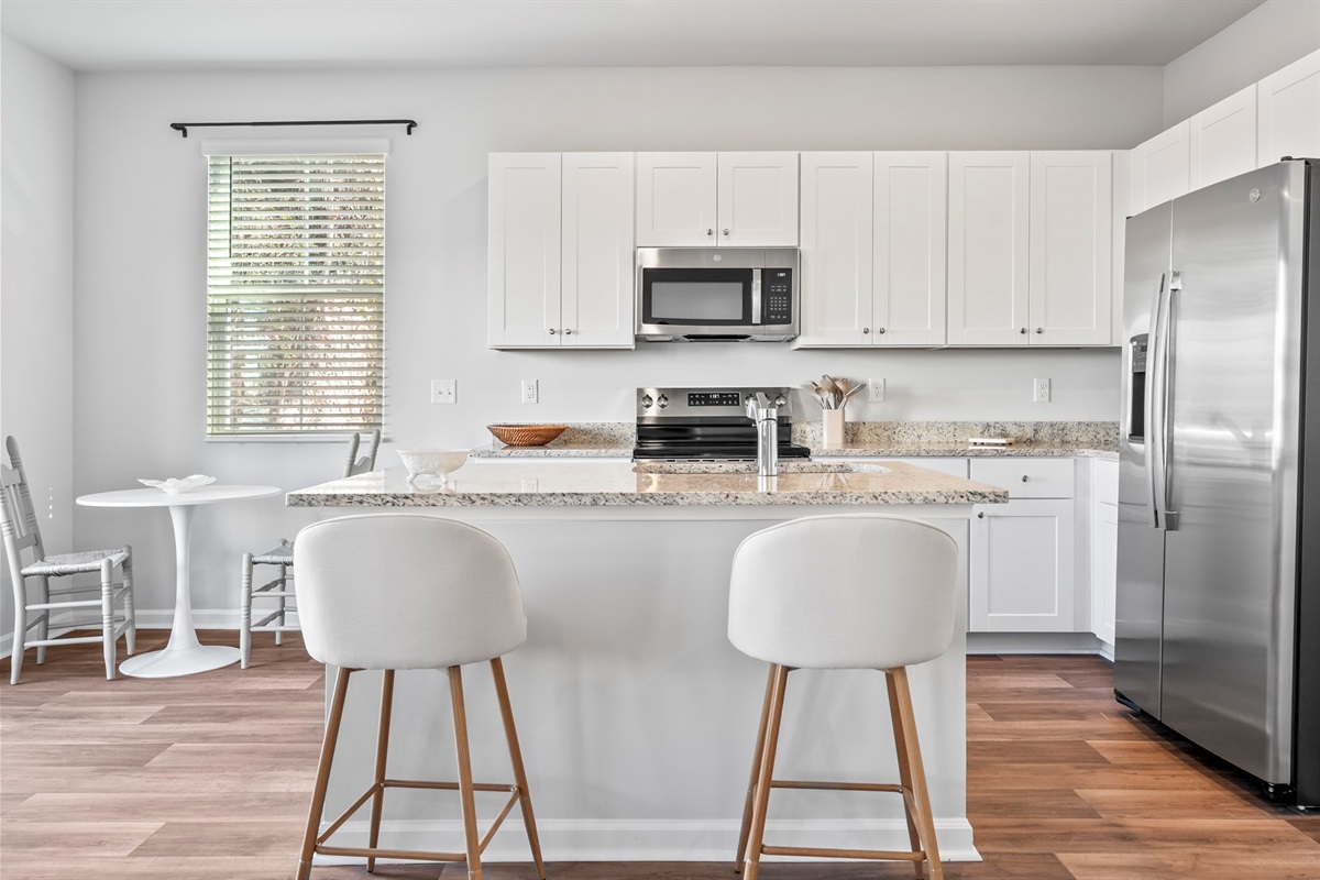 Kitchen with granite countertops and stainelss steel appliances