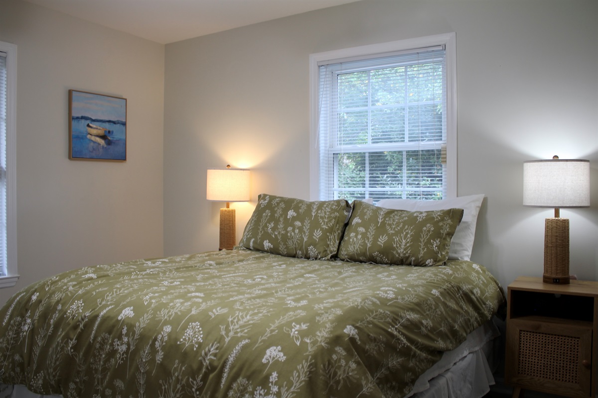 Cozy up in this calming space, styled with earthy tones and simple elegance.