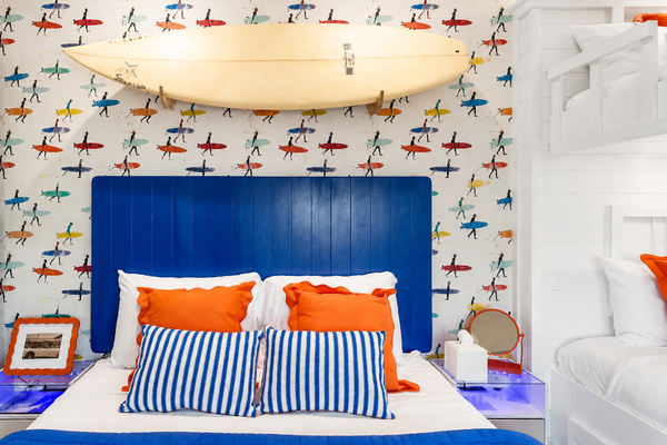 The Sunrise Surf Shop themed bedroom has some of the best views! Enjoy a 43" TV and bunk bed reading lights and personal charging stations.