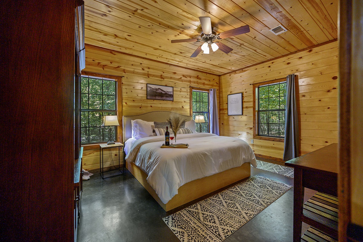 2nd bedroom is large and provides cozy bedding, tv, and closet space.