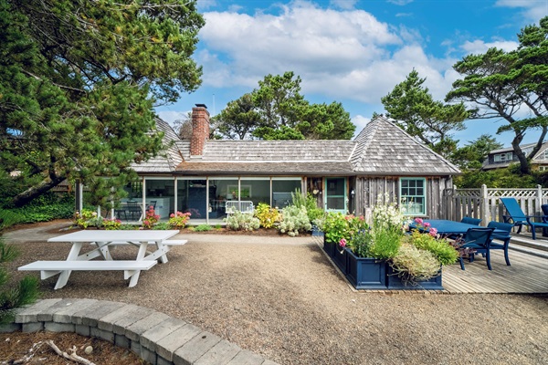 BACK SIDE SHOWCASING FLOOR TO CEILING WINDOWS  private + fully fenced