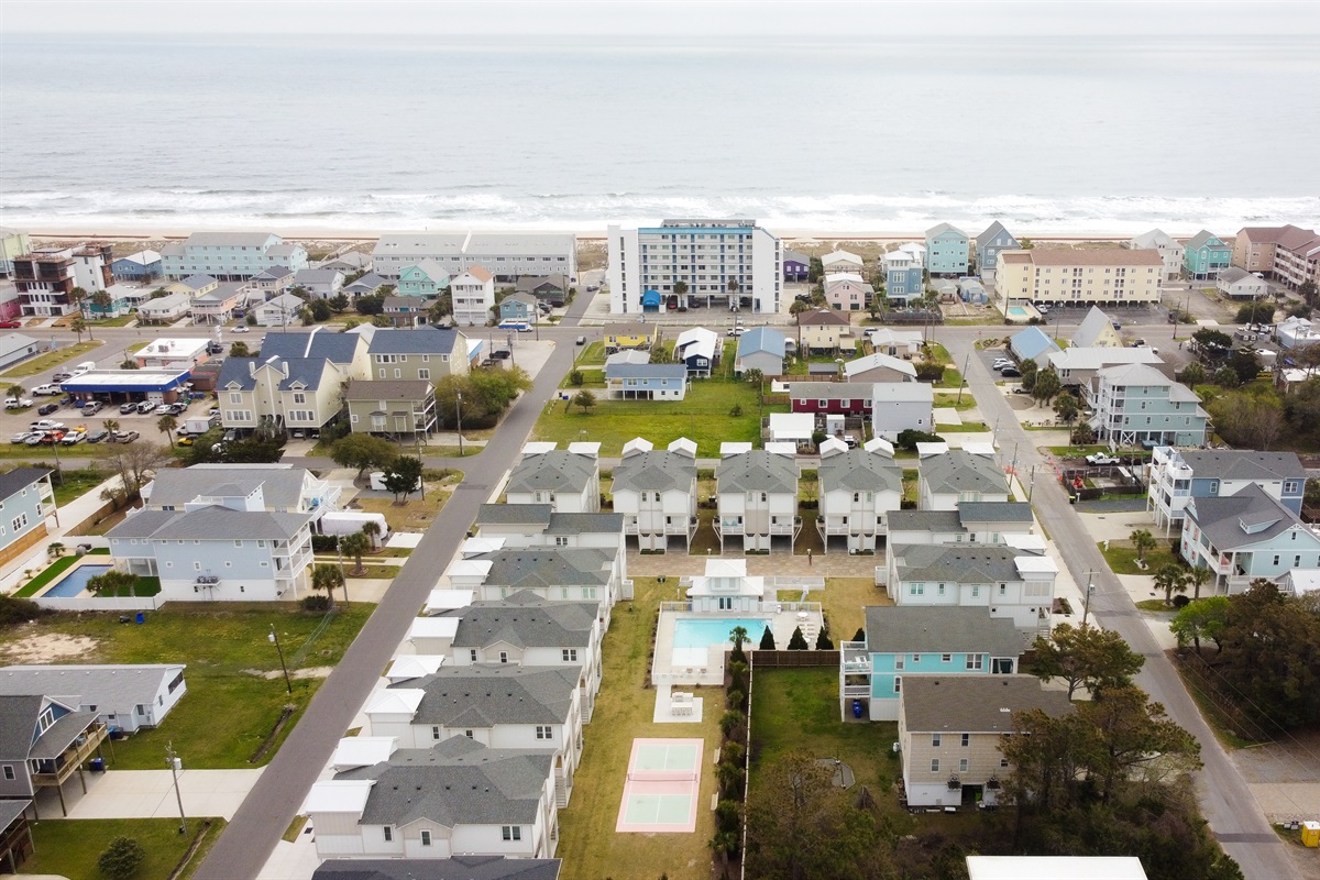 Communal pool, grill, and pickle ball court