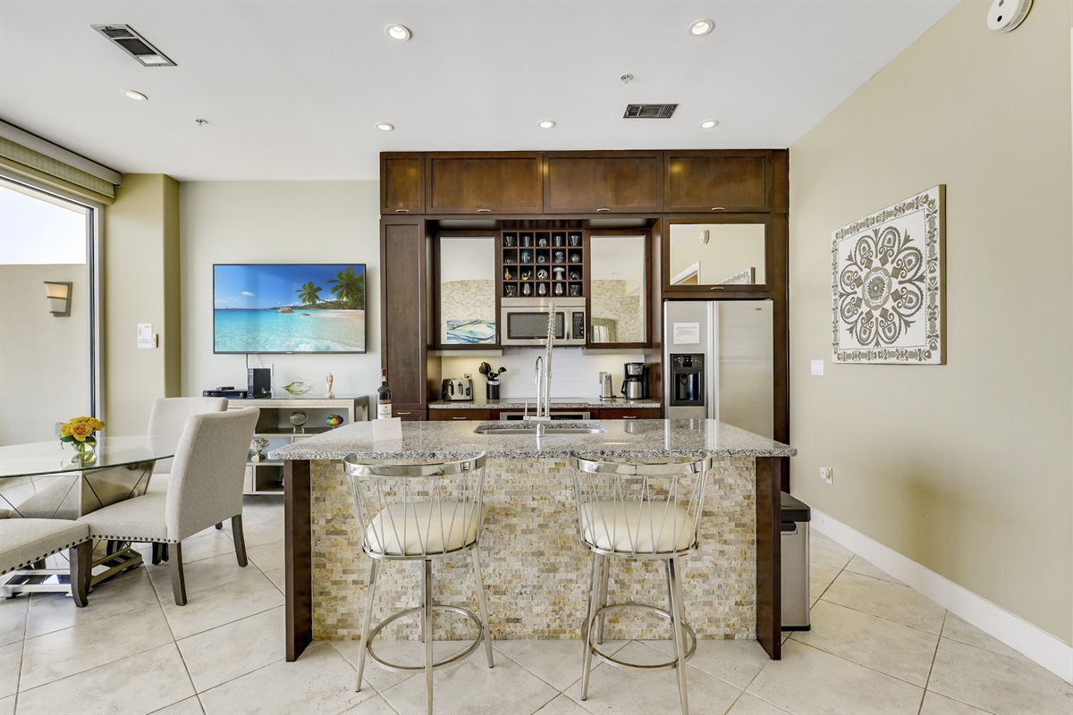 Kitchen and 65" television!