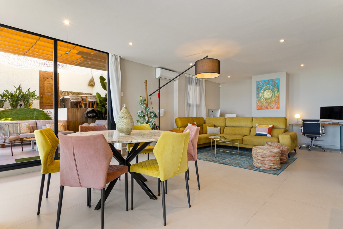Stylish dining and living area connected to the outdoor space