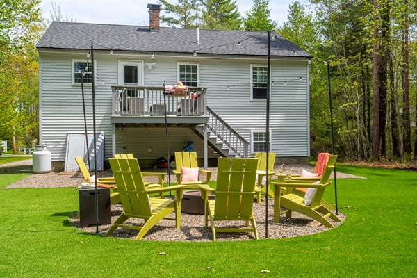 A cozy outdoor firepit area with comfortable seating, perfect for gathering, sharing conversations, and enjoying warm evenings under the open sky.