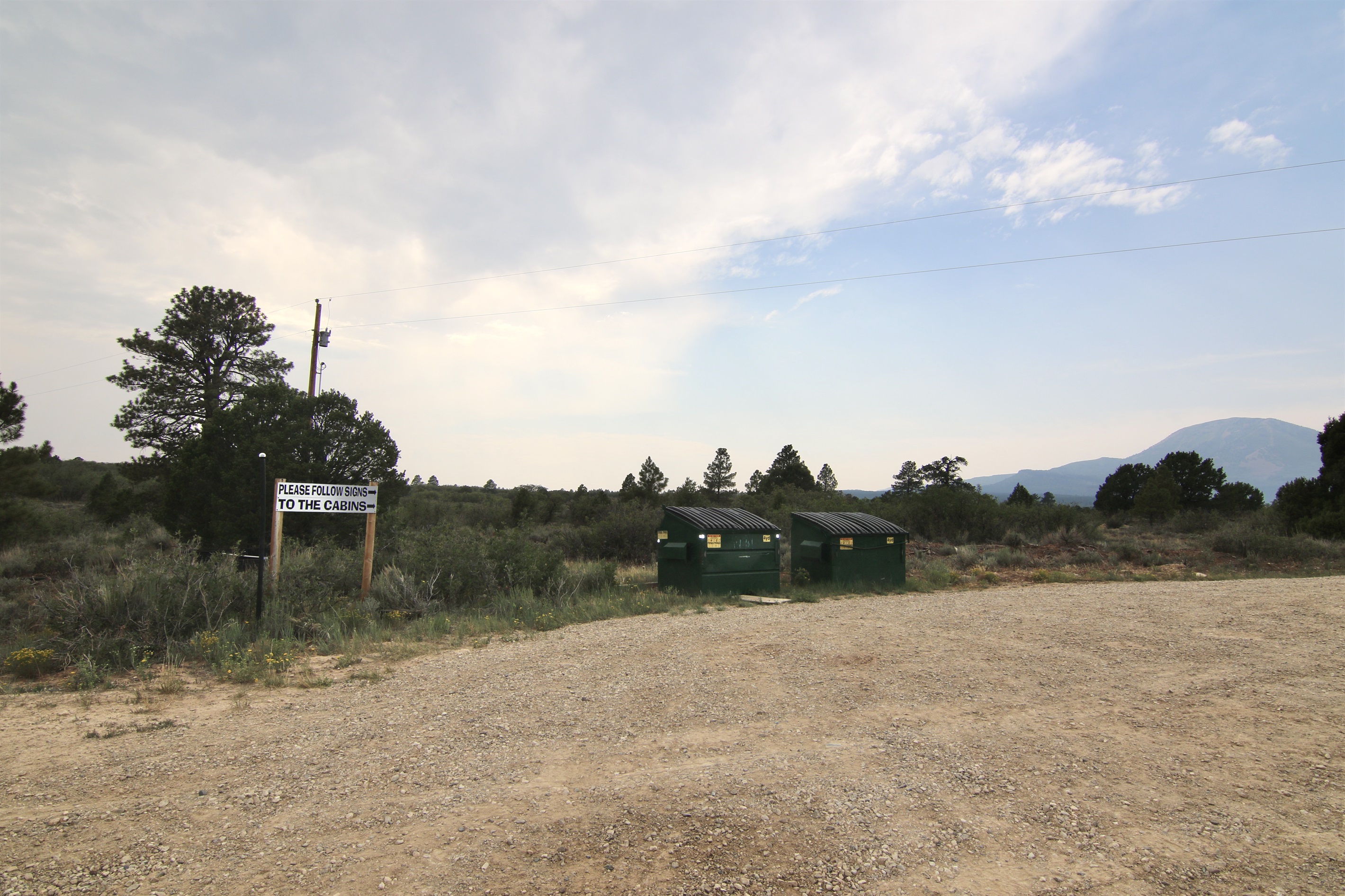 Dumpsters at the entrance of the Ranch