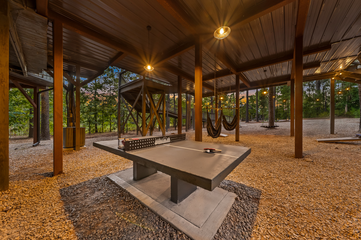 Our new concrete ping-pong table was built for years of friendly competition under the treehouse.
