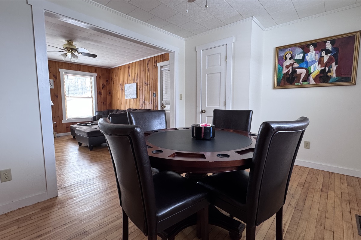 Game room just off of the living room with a poker table