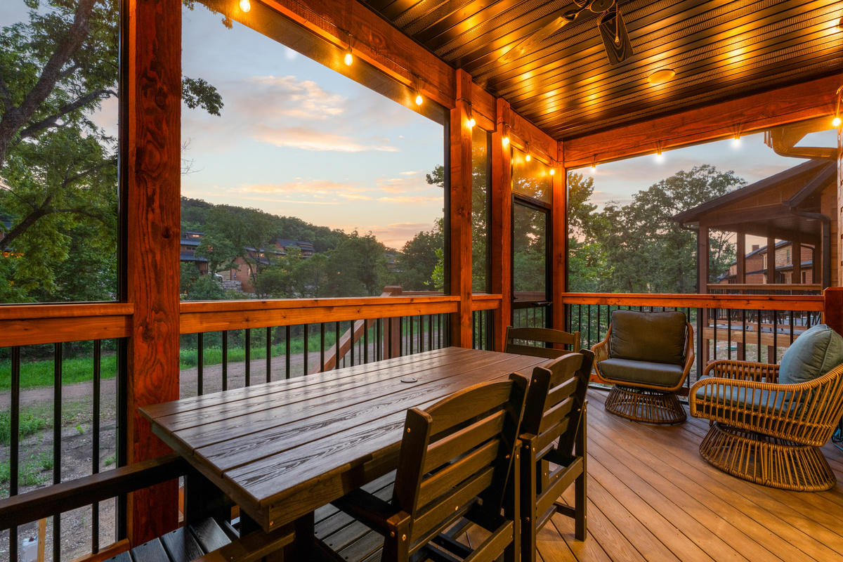 Sunset over the hills from the screened porch, the dinner table waiting.