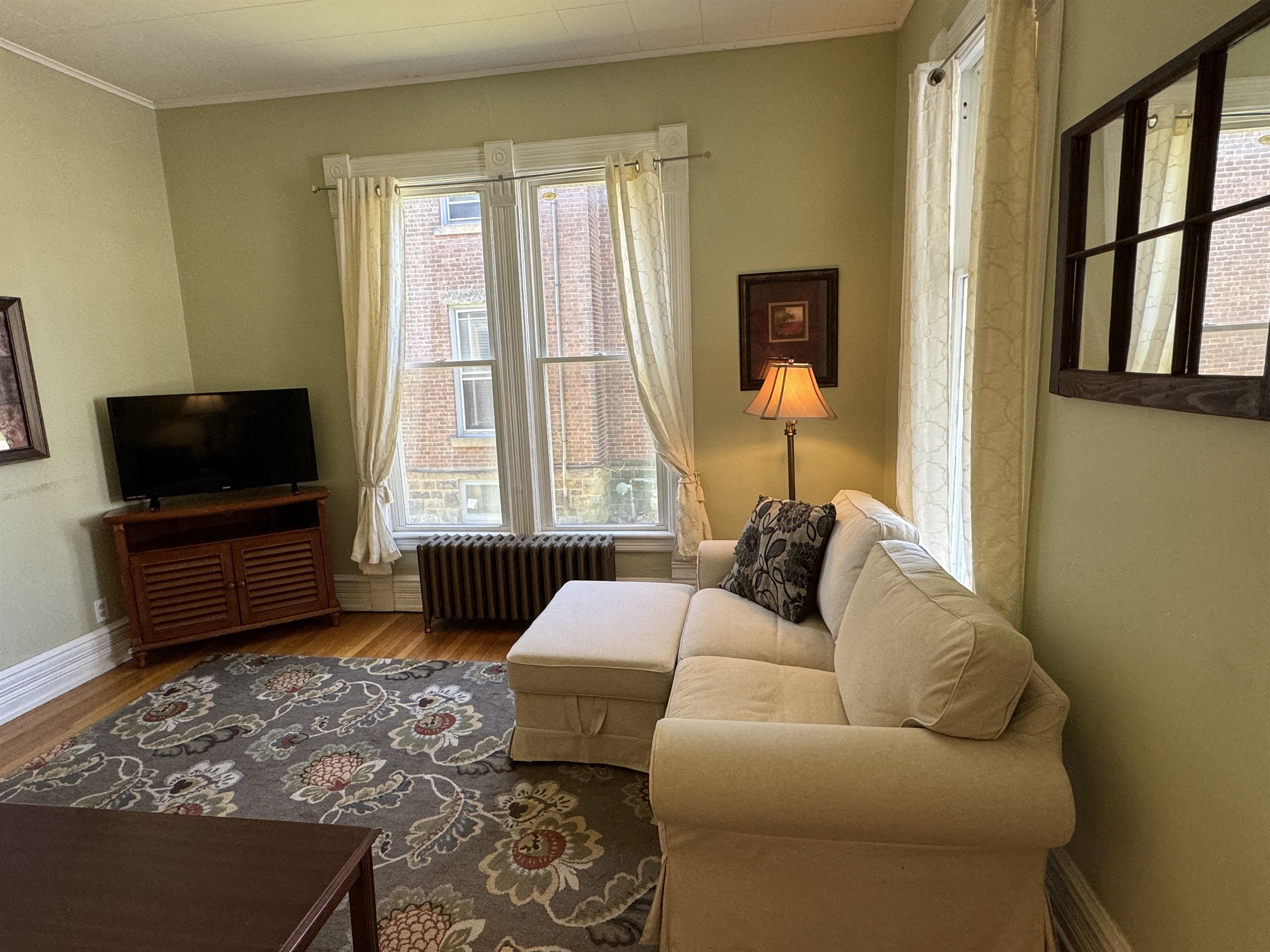 Spacious living room with large windows