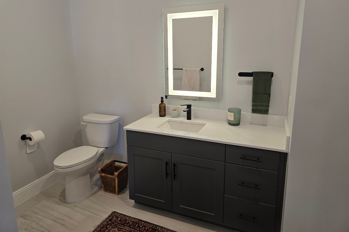Third bathroom off the living room so that guests do not have to walk into the bedrooms